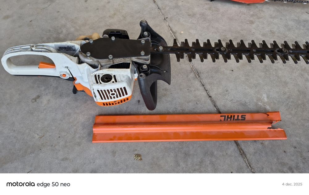 Drujba Dolmar și foarfeca benzina Stihl de tuns gard viu