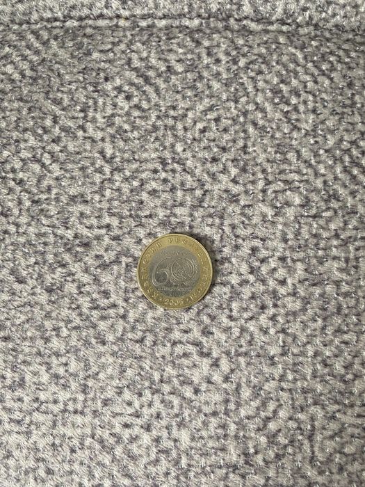 Монета 100 тенге