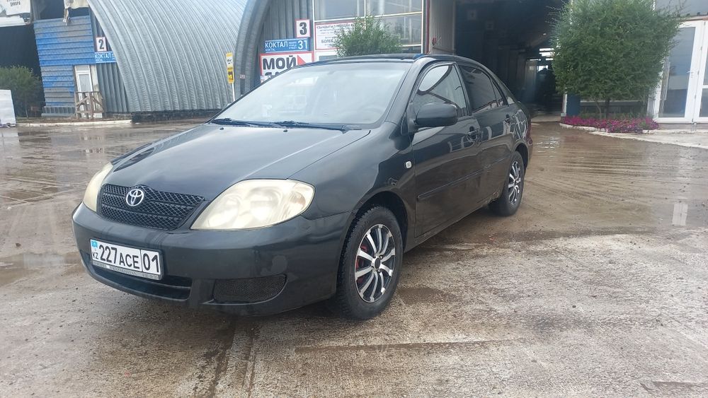Тойота каролла 2004 г