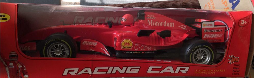 Формула 1, Състезателна кола, F1, с механизъм и звуци, червена , 1:10
