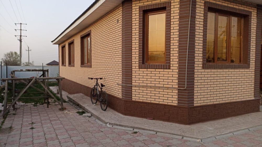 фасадные панели под травертин для вашего дома