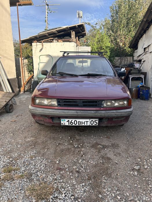 продам митсубиси лансер