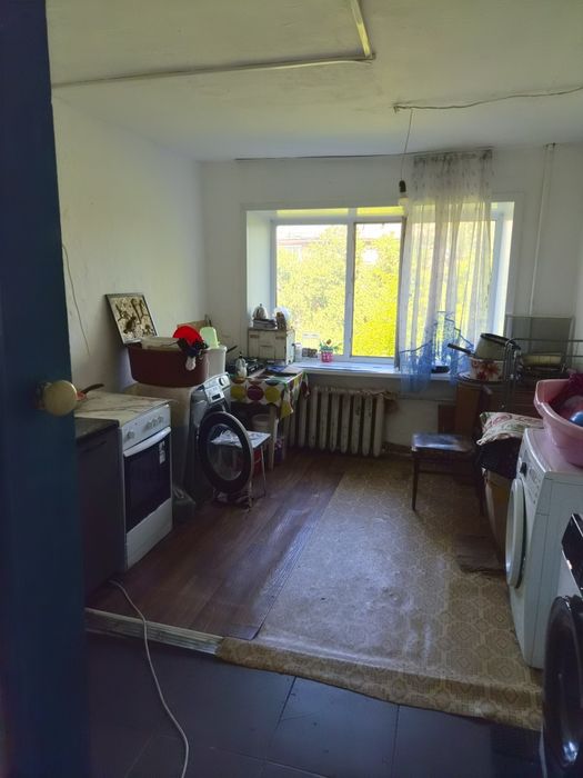 Продажа комнат в коммунальном доме.