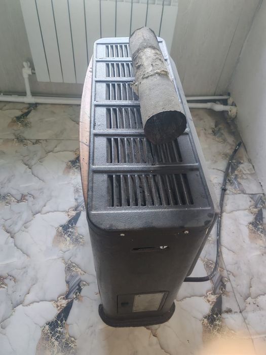 Продам газовый камин , печь