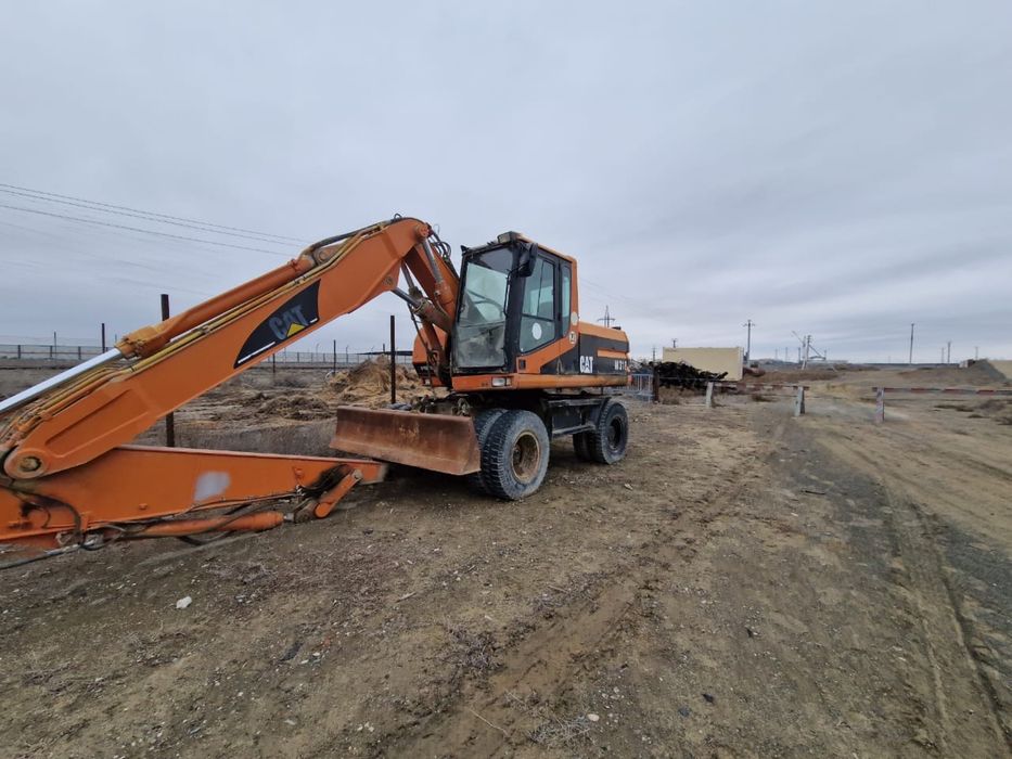 Колёсный экскаватор