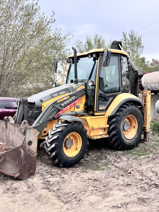 Экскаватор погрузчик 3в1