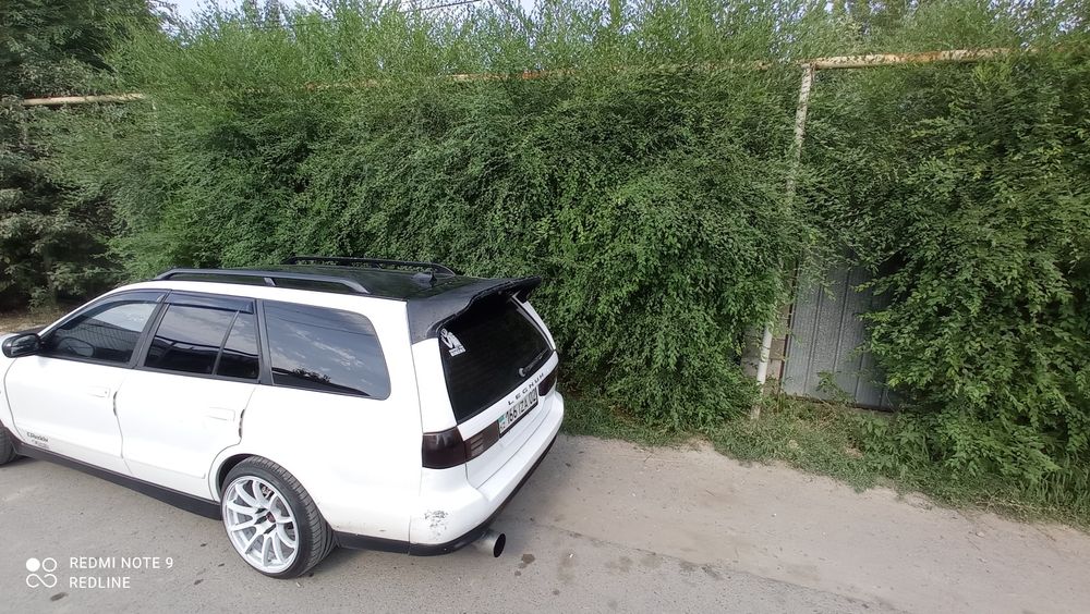 Митсубиси Галант передний бампер , решетка