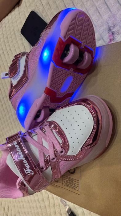 Кроссовки-ролики новые