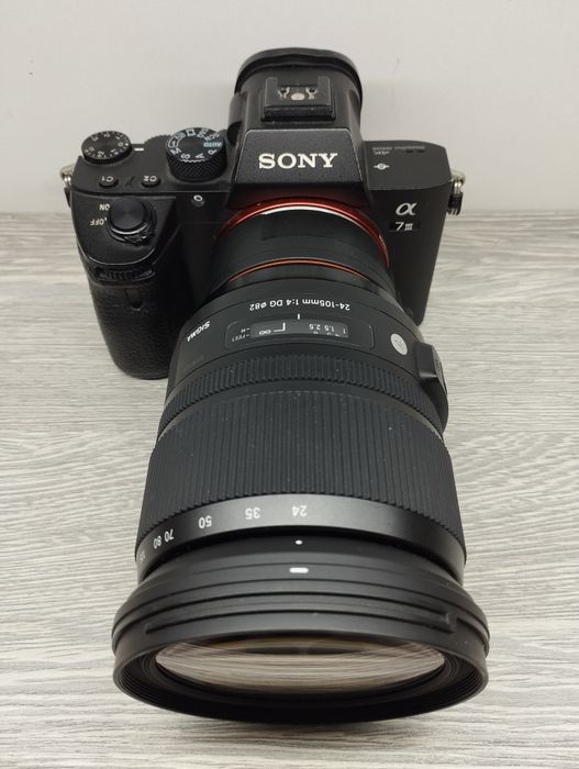 Sony Alpha A7 3, Sigma 24-105 obyektiv bilan 
Sony 24-105 E MOUNT bila