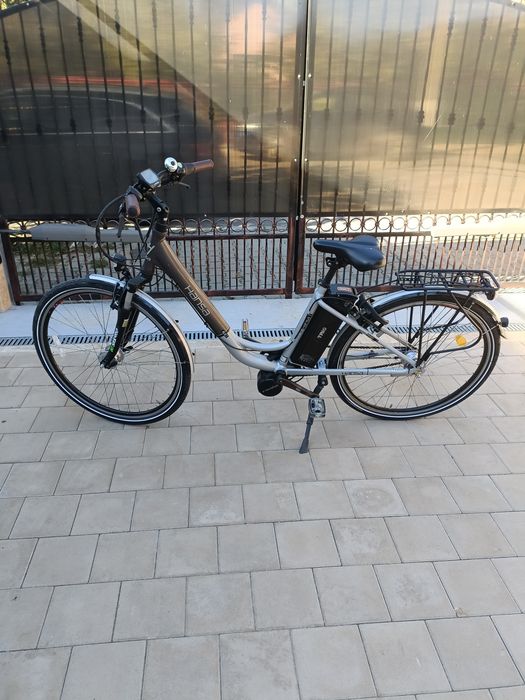 Bicicleta electrica Hansa enovation baterie 36v incarcator st 36v schimbator shimano nexus 7 viteze dinam in butuc pt persoane 150 kg,baterii 24v trio