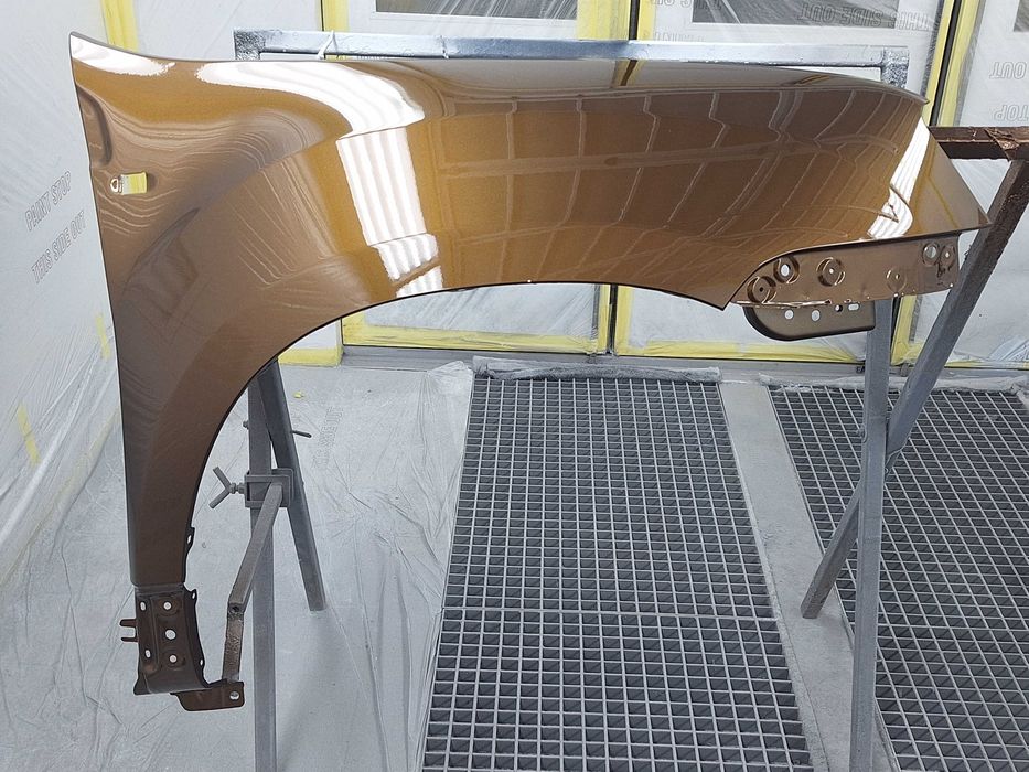 Aripa dreapta fata NOUA vopsita maro CNA Dacia Duster 2010 - 2017