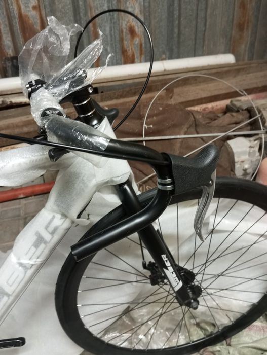 Продам велик новый чёрно-белый