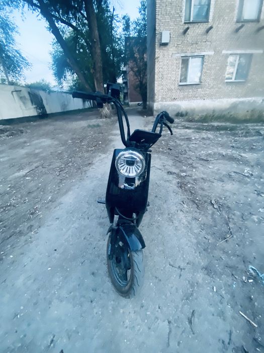 Скутер Caravan.