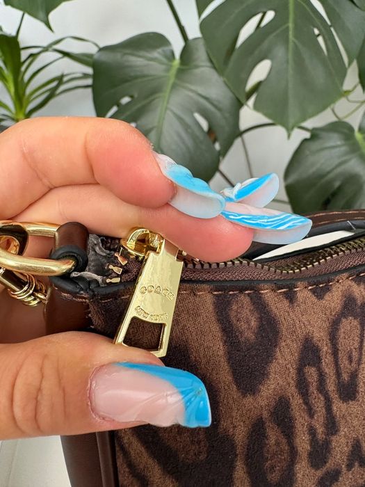 Coach Terry sholder animal print