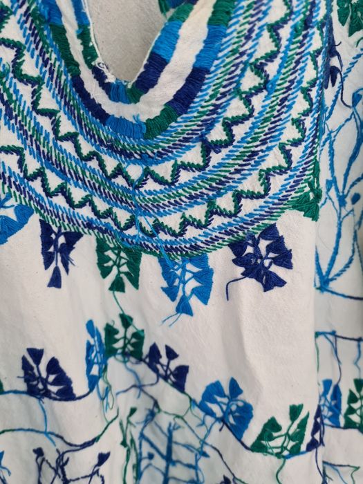 Ie cusuta manual pentru femei