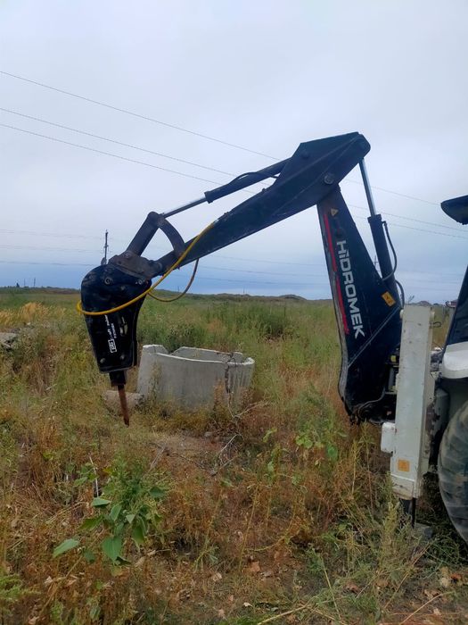 Услуги экскаватор погрузчик HIDROMEK гидромолот