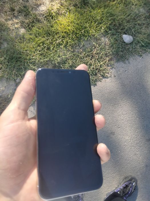 Iphone XS почти .