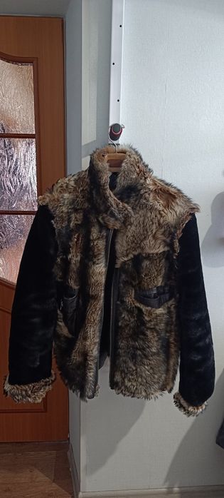 Продам куртку с мехом