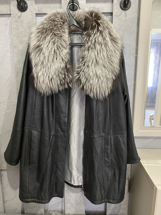 Продам новое кожаное пальто с богатой чернобуркой