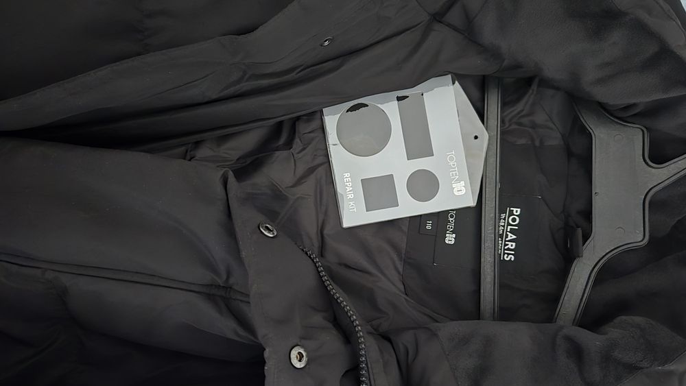 Продам фирменный Пуховик