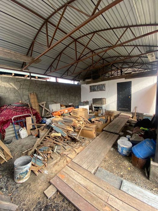 Дом, улица Калиева, Танат Империя