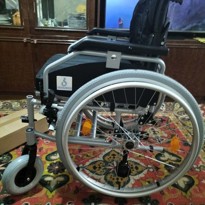 Инвалидная коляска