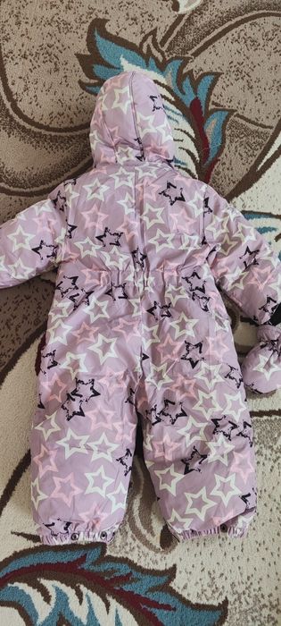 Продам зимний комбинезон для девочки