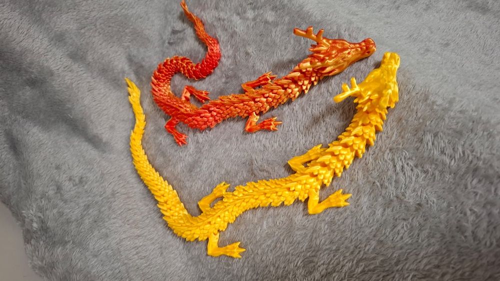 3D-игрушки драконы и змейки