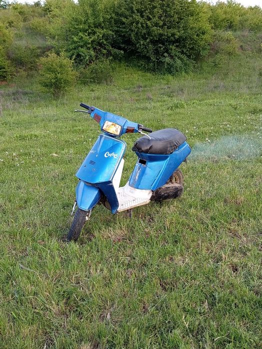 Скутер suzuki karna