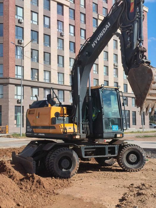 Услуги аренды экскаватора Хюндай 145/210