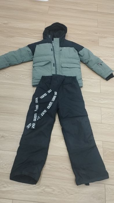 Продам зимний комбинезон Gusti