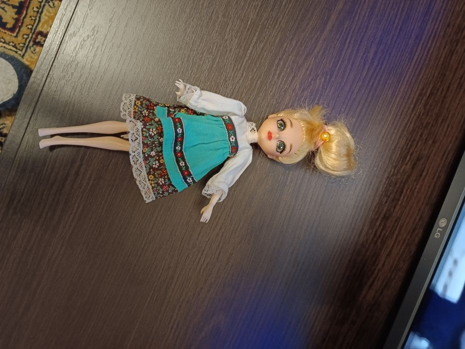 Куклы говорящая в розовой одежде