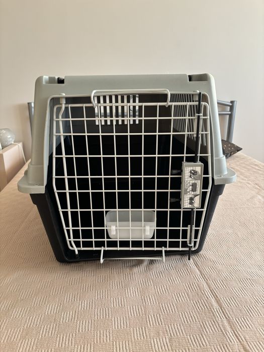 Клетка за транспортиране на малко куче на марката Ferplast.
