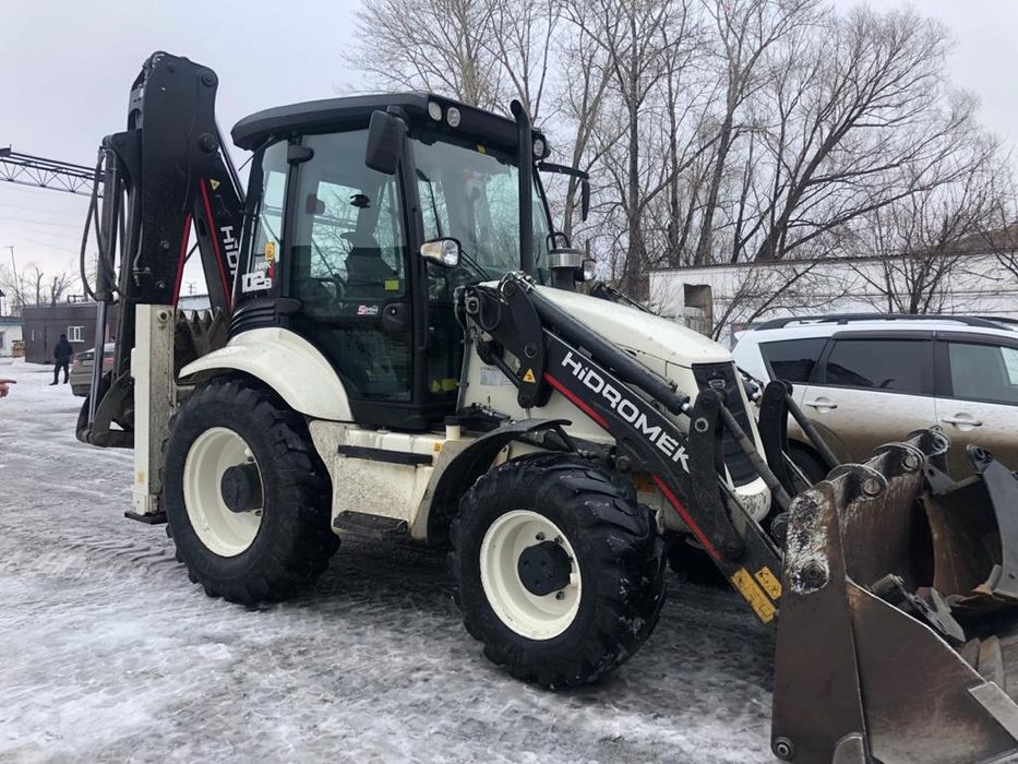 Услуги экскаватора-погрузчик ГИДРОМОЛОТ
