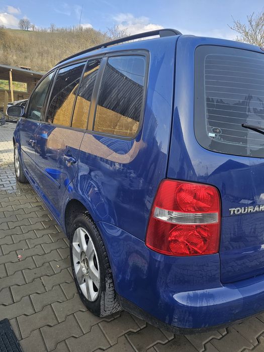 Vând Urgent Touran , citește anuntul