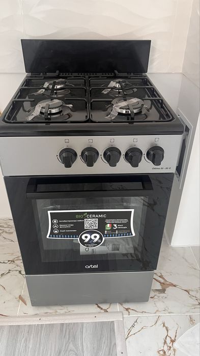 Новый газовая плита