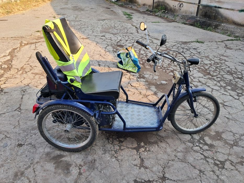 Schimb triciclu pe benzină cu triciclu electric