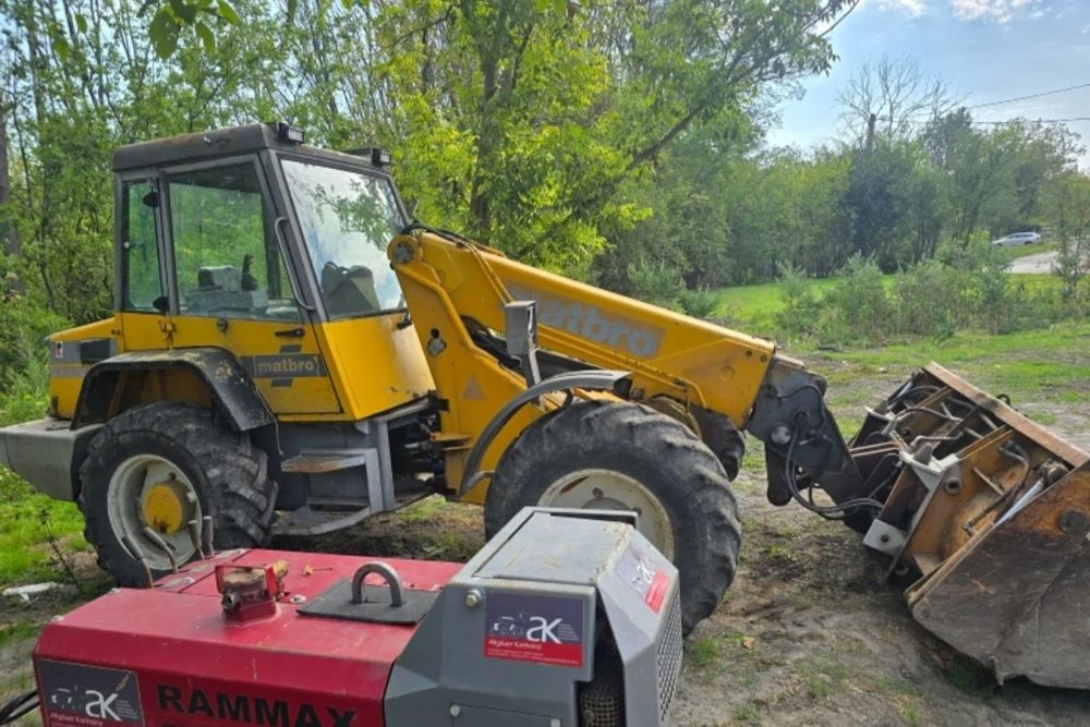 Телескопичен челен товарач