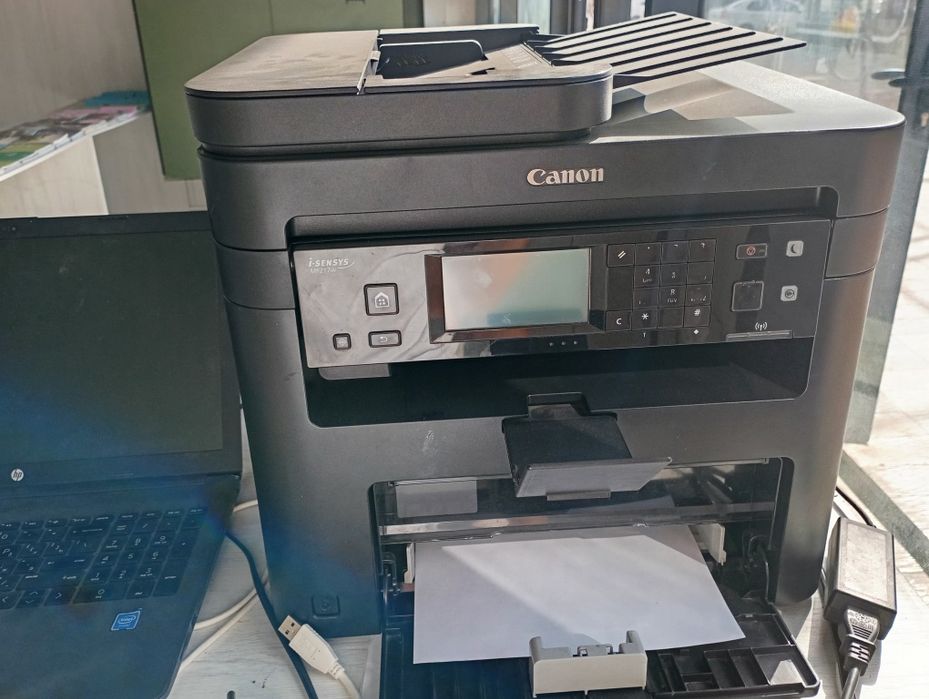 Canon MF217W oq qora skaner qiladi