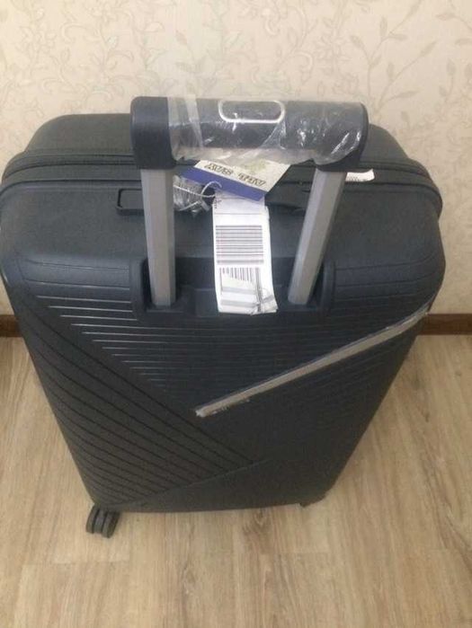 Продаётся новый дорожный чемодан
