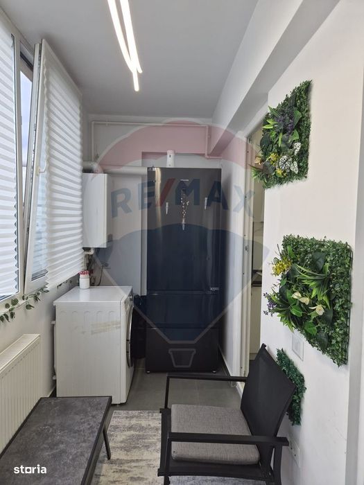 Apartament luminos cu 2 camere, mobilat complet si cu loc de parcare