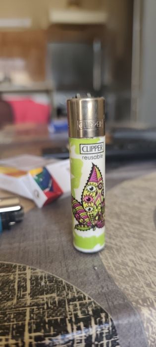 Колекция от 37 оригинални запалки Clipper + подарък дисплей (поставка)