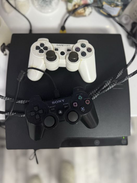 Vand Play Station 3 + 15  jocuri