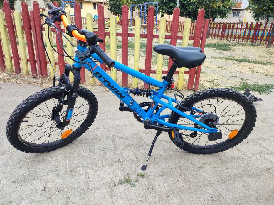 Bicicleta aproape noua