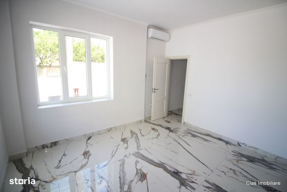 Spatiu Comercial Cladire pe colt cu 2 intrari si locuri de parcare !!