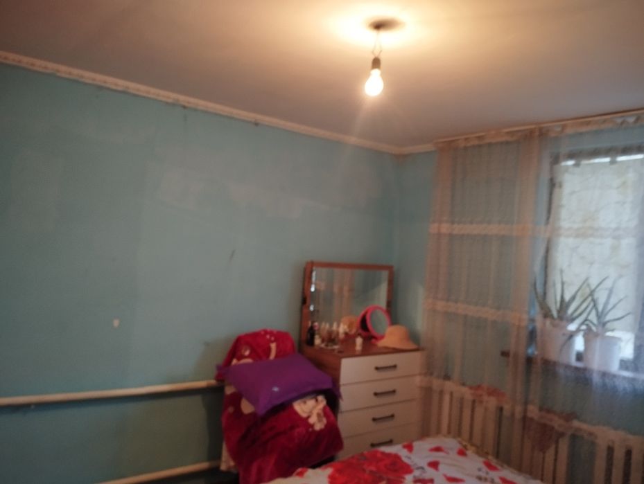 Продам дом в центре Ащибулака