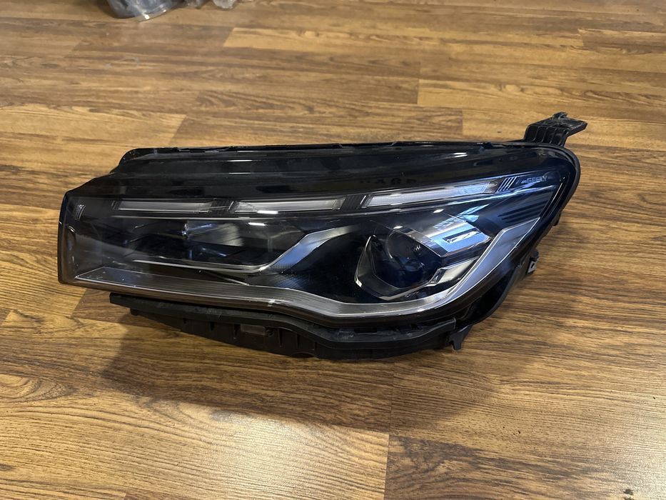 Фара левая Geely Emgrand