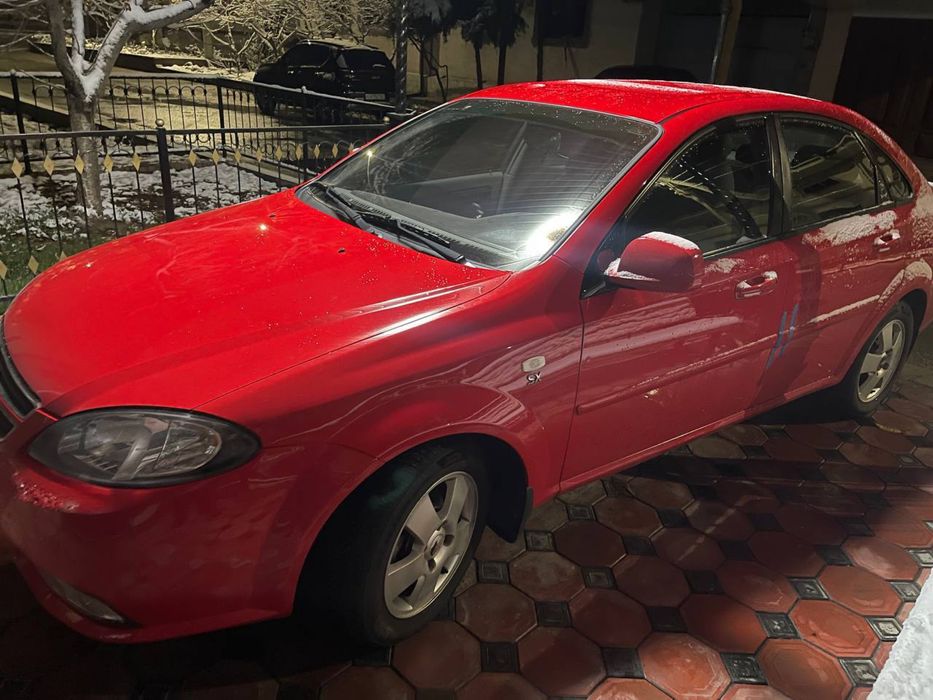 Gentra yili 2015 qizil rang