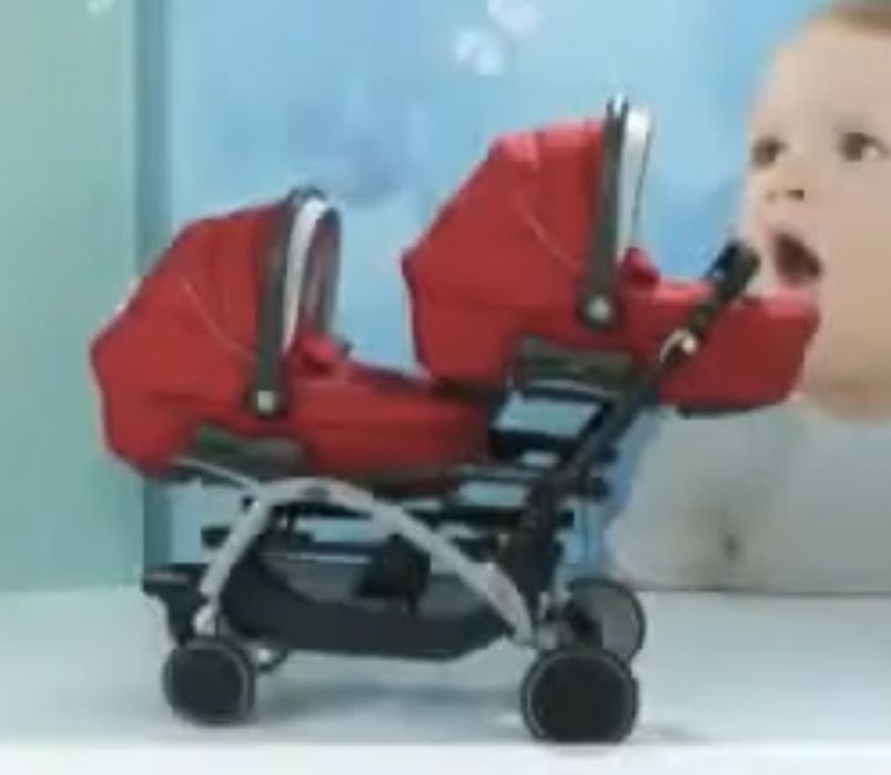 Коляска для двойни (близняшек)