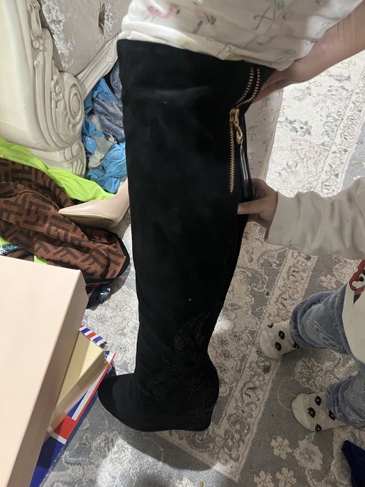 Длинные сапоги